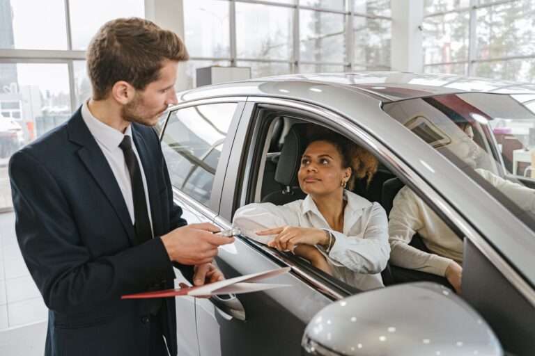 husband gave away car story showing a woman receiving keys to a new car